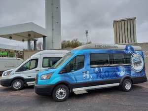 A picture of 2 hydrogen fuel cell vans at SARTA's Headquarters Hydrogen Fueling station.