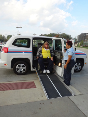 SARTA driver assisting rider off the bus