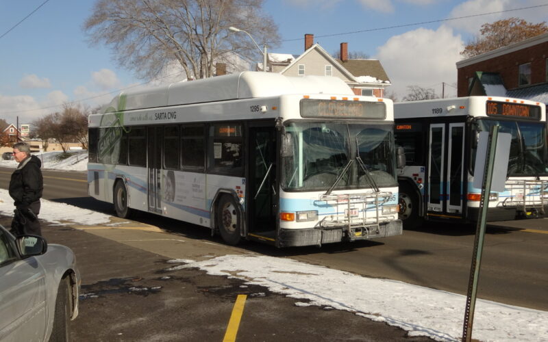 Image of two SARTA Fixed Route Buses on the road