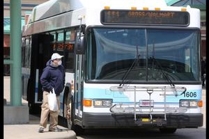 Rider boarding a SARTA bus.