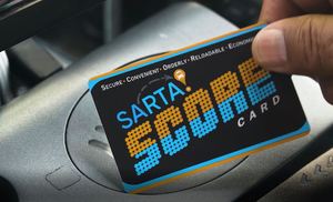 SCORE Card being tapped on the card reader on the Farebox