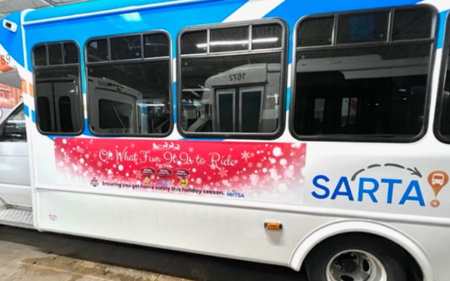 SARTA Paratransit Bus with Safe Communities Advertisement that says Oh what fun it is to ride.