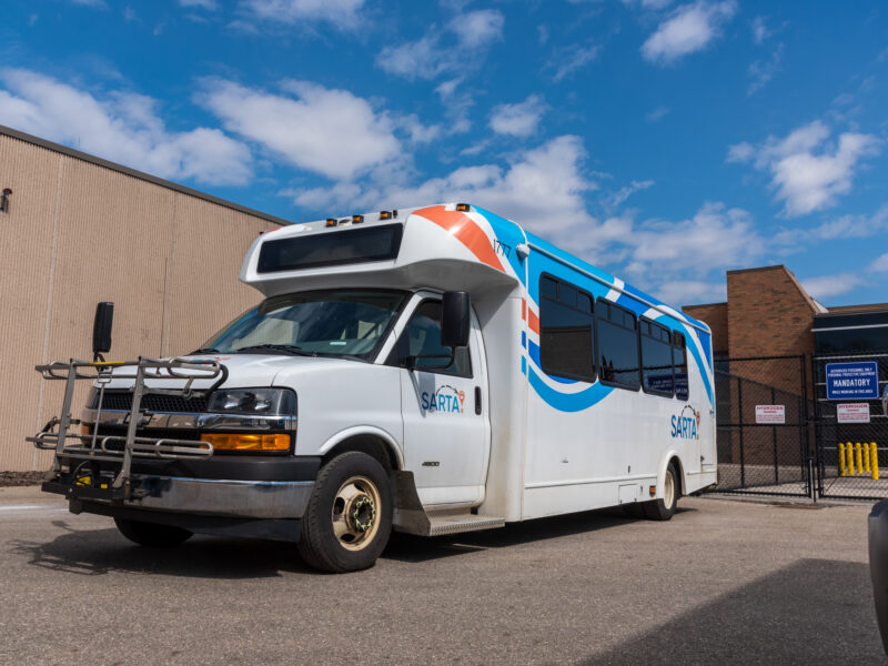 This is an image of a SARTA paratransit bus parked outside of SARTA's bus garage.